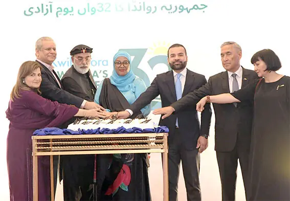 Minister of State for Law and Justice Barrister Aqeel Malik, Senator Talha Mahmood, High Commissioner of Rwanda Harerimana Fatou and others cut the cake during a reception on Rwanda National Liberation Day on Saturday. — White Star