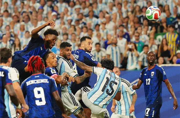 MIAMI GARDENS: Argentina’s Cristian Romero (fifth R) heads to score the winner against Cape Verde during their round-of-32 match at the Miami Stadium.—Reuters