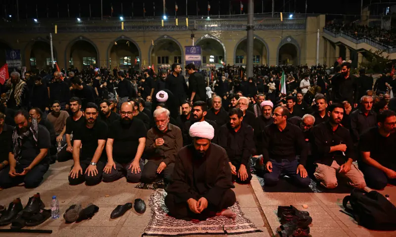  Mourners pray as the gather to pay tribute to Iran&rsquo;s assassinated supreme leader Ayatollah Ali Khamenei at the Grand Mosalla on the second day of funeral ceremonies in Tehran on July 5, 2026. &mdash; AFP 