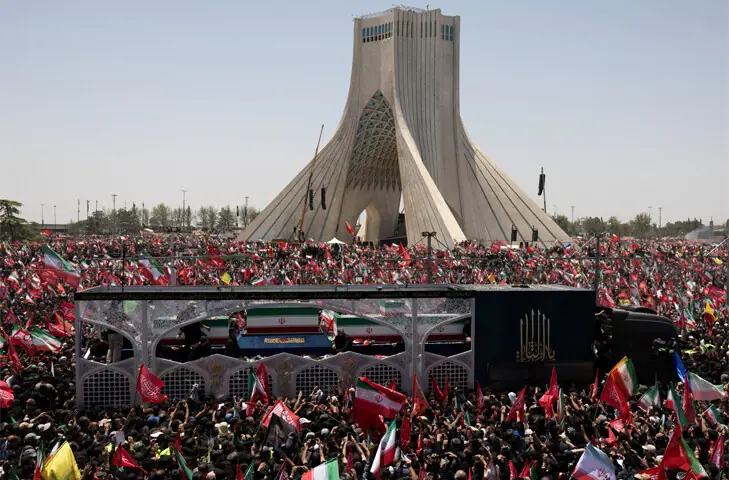 The coffins of Ayatollah Ali Khamenei and members of his family pass near Tehran’s Azadi Tower through a sea of mourners, gathered to attend the late supreme leader’s funeral.—Reuters