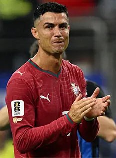 PORTUGAL’S Cristiano Ronaldo looks dejected after the match against Spain at the Dallas Stadium.—Reuters