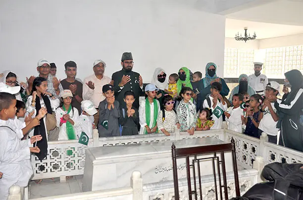  PEOPLE visiting the Mazar-i-Quaid offer fateha on the grave of Madar-i-Millat Mohtarma Fatima Jinnah on her 59th death anniversary on Thursday.&mdash;Online 
