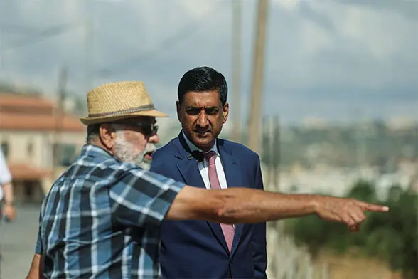 US REPRESENTATIVE Ro Khanna (right) listens to a Palestinian resident near Ramallah.—Reuters