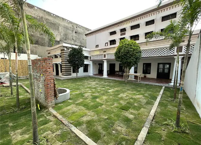 The lawn and veranda of the palatial library.