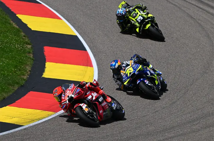 Hohenstein-Ernstthal: Ducati Lenovo Team’s Marc Marquez (front) of Spain and compatriot Alex Marquez of BK8 Gresini Racing MotoGP compete during the German Grand Prix MotoGP at Sachsenring on Sunday.—Reuters