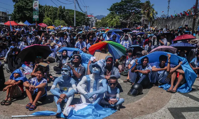 Football fans watch a live broadcast of the 2026 FIFA World Cup quarter-final match between Argentina and Switzerland, on July 12, 2026.. — AFP