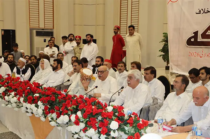 ANP leader Mian Iftikhar Hussain addresses the jirga in Batkhela on Monday. — Dawn