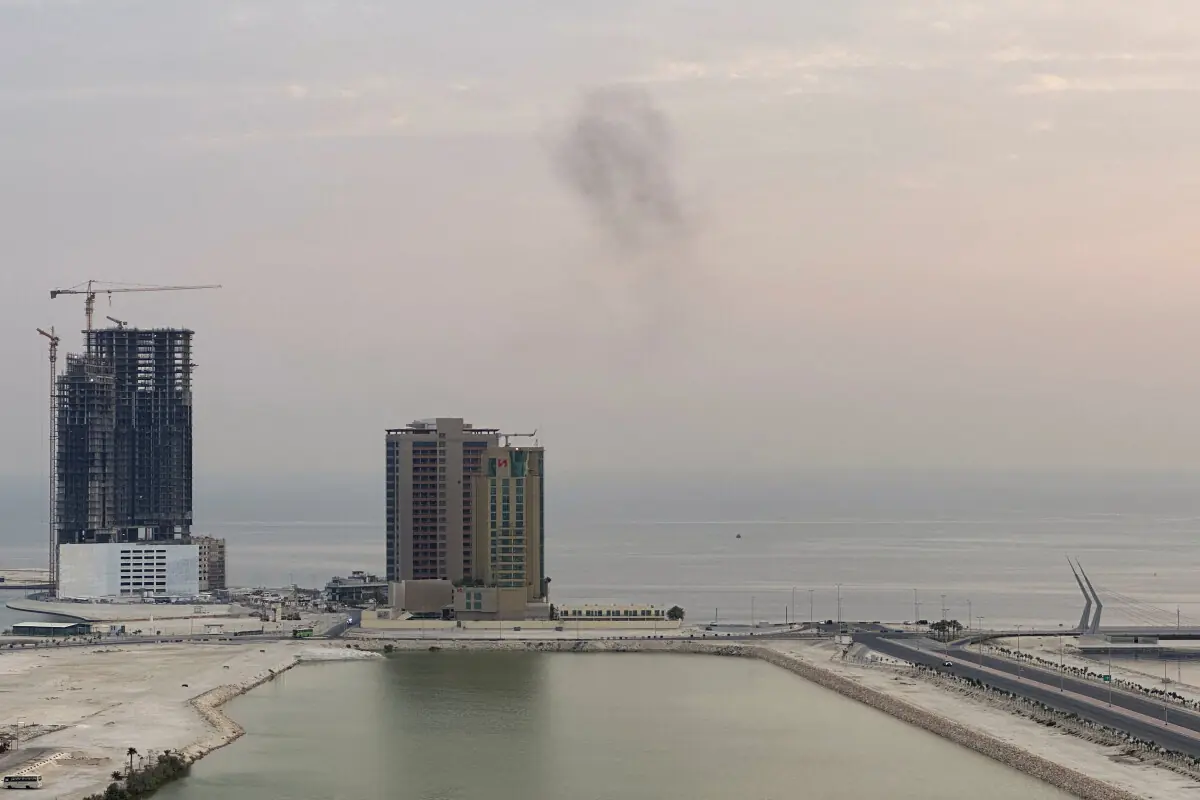 Smoke rises after a drone was intercepted during early morning hours in Manama, Bahrain, July 14, 2026. &mdash;Reuters