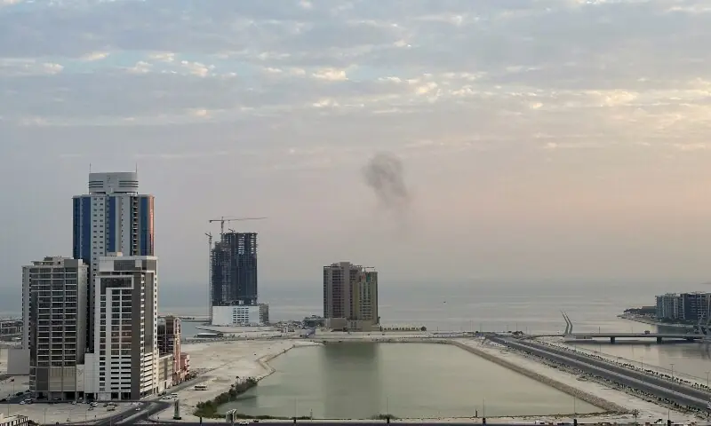 Smoke rises after a drone was intercepted during early morning hours in Manama, Bahrain, July 14, 2026. &mdash;Reuters