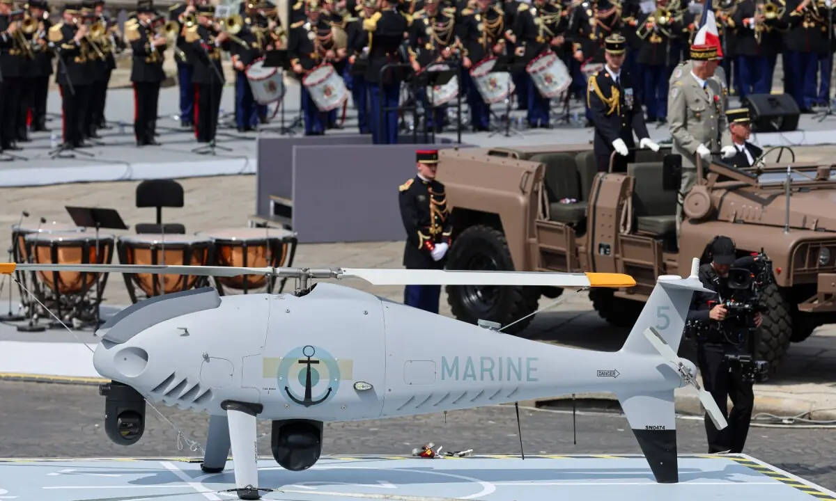 A drone S100 as carried by members of the Naval Aviation Force Flotilla 36F during the annual Bastille Day military air show over the Champs-Elysees Avenue in the background in Paris on July 14, 2026. &mdash;AFP