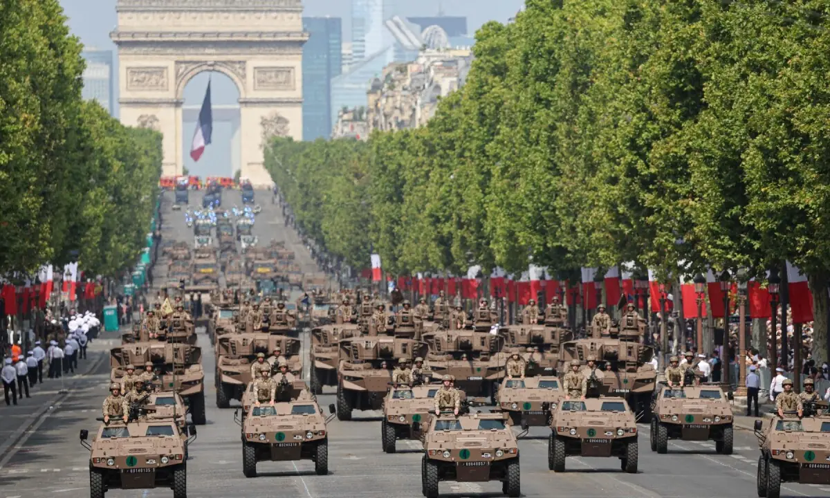 France&rsquo;s Armed Forces drive their motorised vehicles during the annual Bastille Day military parade on the Champs-Elysees Avenue in Paris on July 14, 2026. &mdash;AFP