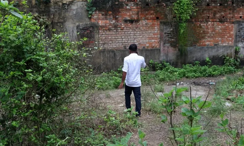 Father of an 11-year-old girl who was raped and killed speaks on his mobile phone in a town near Kolkata, West Bengal, India on July 11, 2026. —Reuters/File