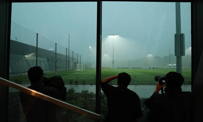 Members of the media try to record adverse weather conditions after an Argentina’s training session was postponed in Morristown, New Jersey, on July 18, 2026. — AFP