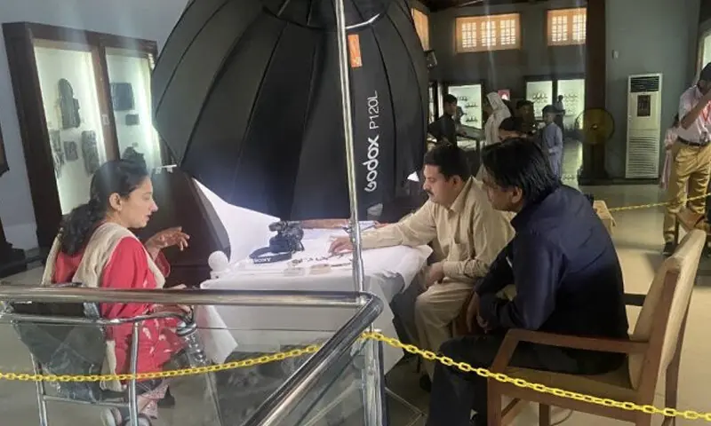 Former curator of Taxila Museum, Humera Naz (left), and former deputy director of Taxila Museum, Anjum Dara (right), overseeing digitisation work at the Taxila Museum in 2024 | Photo courtesy Sirat Gohar Daudpoto
