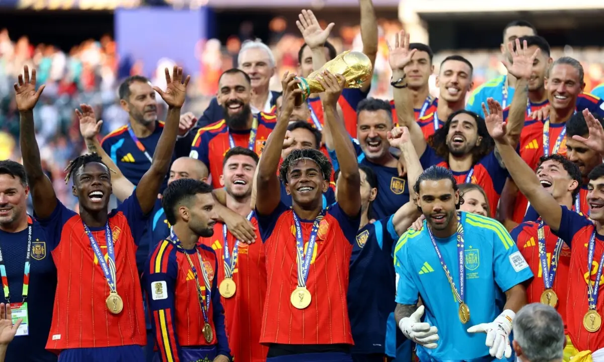 Spain&rsquo;s Lamine Yamal lifts the FIFA World Cup trophy as the team celebrates their victory at the New York/New Jersey Stadium, East Rutherford, New Jersey, the US on July 19, 2026. &mdash; Reuters
