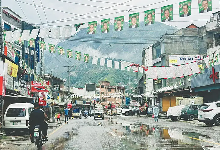 Electioneering gathers momentum in Muzaffarabad as campaign posters of candidates from political parties adorn the city’s Plate neighbourhood ahead of the July 27 AJK Legislative Assembly elections. — Photo by the writer