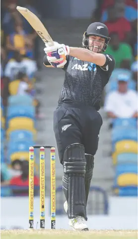 BRIDGETOWN: New Zealand batter Mark Chapman plays a stroke during the fourth ODI against West Indies at the Kensington Oval.—AFP