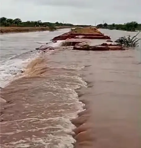   The under-construction pathway to the bridge linking Dhoke Vaince to the Lillah Highway was washed away by torrential flooding in the Salt Range area. &mdash; Dawn 
