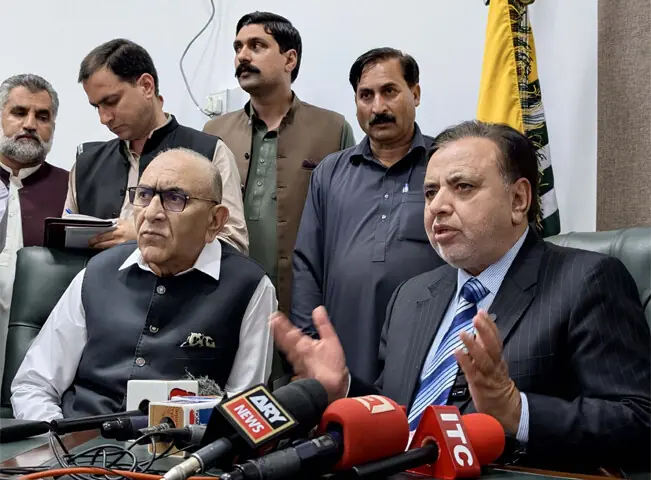 AJK Chief Election Commissioner Ghulam Mustafa Mughal announces the rescheduling of elections.—Photo by the writer