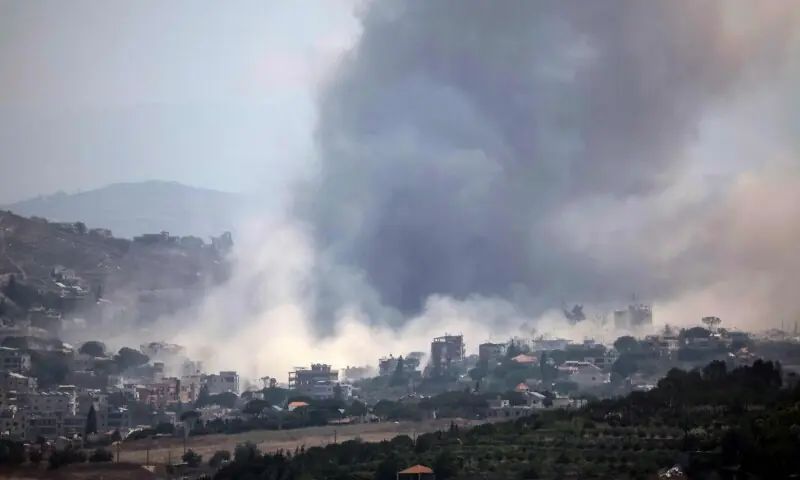 This image taken from the vicinity of the village Zawtar al-Sharqiyah in southern Lebanon, shows smoke rising from the site of an explosion carried out by the Israeli military, in the village of Kfar Tibnit on July 23, 2026. &mdash;AFP