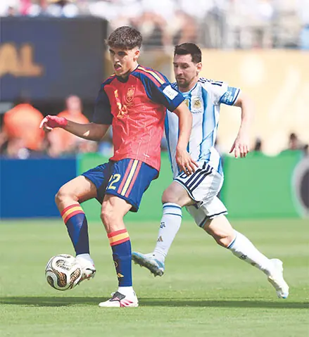 Lionel Messi of Argentina competes for the ball against Spain’s Pau Cubarsi in the final.— AFP