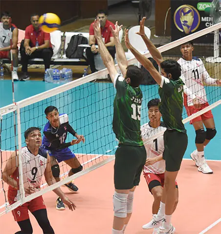    PLAYERS in action during the CAVA Volleyball Championship match between Pakistan and Nepal at the Liaquat Gymnasium on Friday. &mdash;Tanveer Shahzad/White Star   