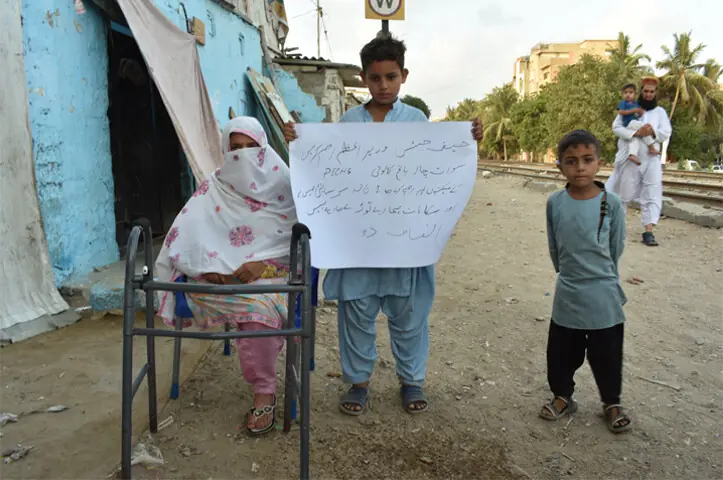 Residents in Karachi's Swat Char Bagh Colony who were evicted due to 'urban flooding measures', pictured in June 2021: the debate surrounding the ML-1 and the KCR illustrates broader displacement challenges confronting Karachi