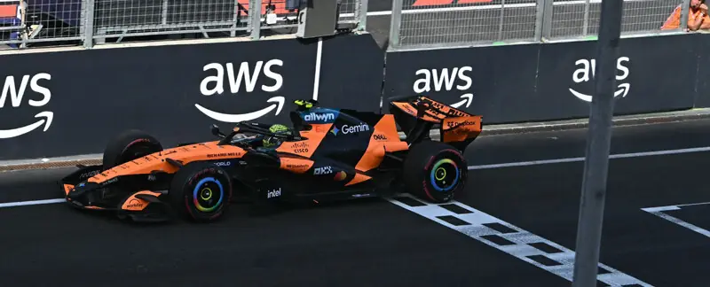 MCLAREN’S British driver Lando Norris drives through the finish line to win the Formula One Hungarian Grand Prix at the Hungaroring racetrack on Sunday.—AFP
