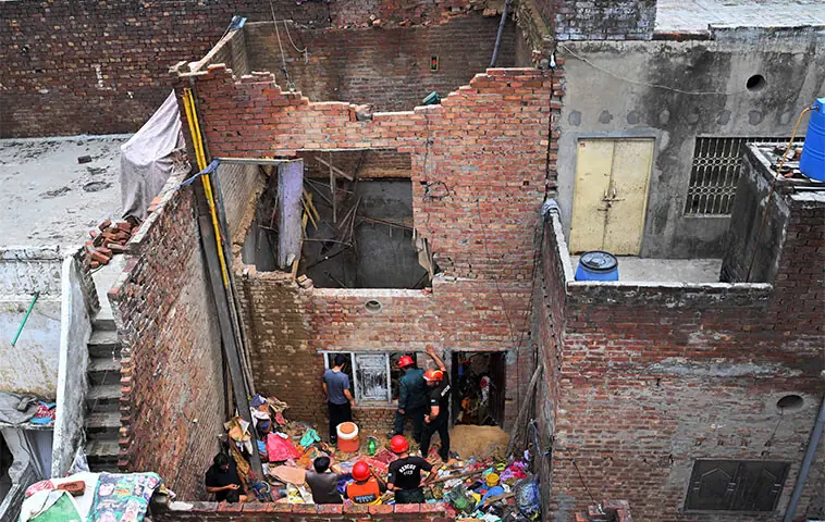 11 killed in three-storey house collapse
