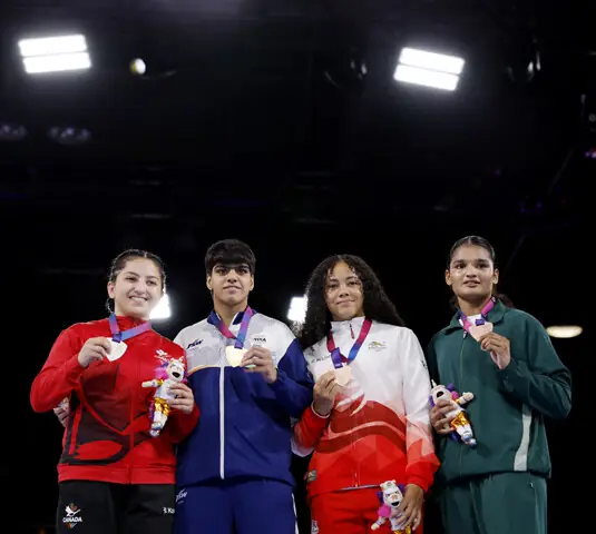 GLASGOW: Commonwealth Games women’s 60kg boxing bronze medallists Fatima Zahra (R) of Pakistan and England’s Lucy Kings-Wheatley (second R), gold winner Priya Ghanghas (second L) of India and silver medallist Canada’s Marie-Bathoul Al-Ahmadieh celebrate on the podium at the SEC Centre.—Reuters