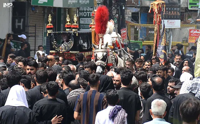 Mourners participate in the traditional Chehlum procession at Teli Mohalla in Rawalpindi on Tuesday. — INP