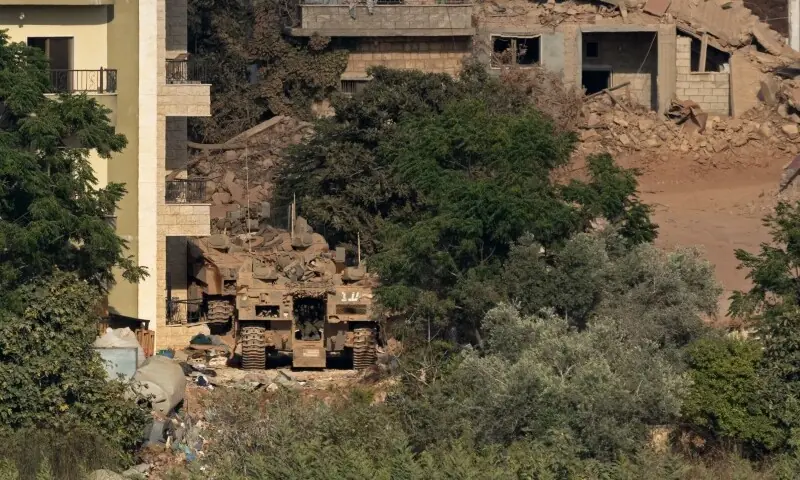 This photograph taken from the southern Lebanese village of Zawtar al-Gharbiyah shows Israeli tanks stationed in the nearby village of Zawtar al-Sharqiyah, on August 7, 2026. &mdash;AFP