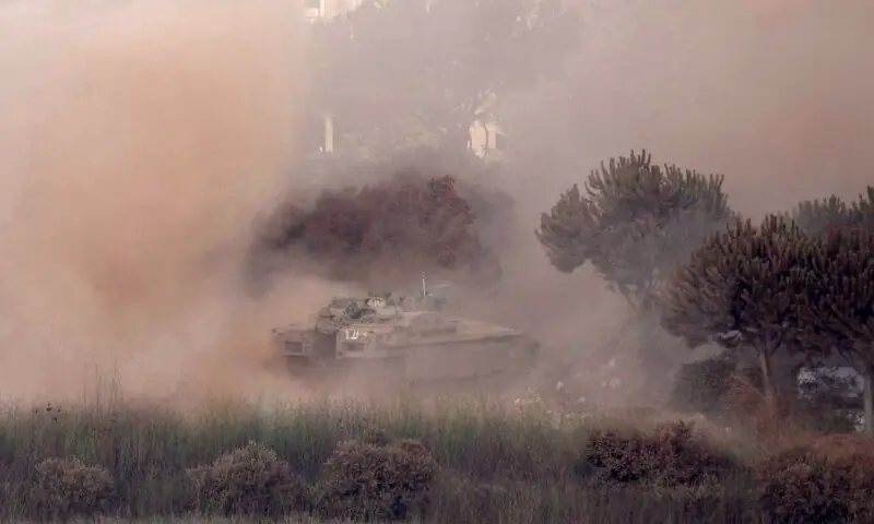 This photograph taken from the southern Lebanese village of Zawtar al-Gharbiyah shows Israeli tanks stationed in the nearby village of Zawtar al-Sharqiyah, on August 7, 2026. &mdash;AFP
