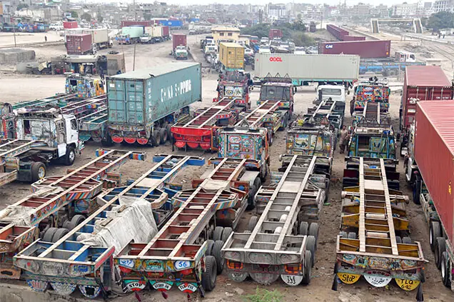 KARACHI: Goods carriers remain parked in Mauripur on Saturday, disrupting cargo movement to and from the city’s ports.—Online