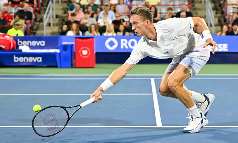 MONTREAL: Jiri Lehecka of the Czech Republic plays a backhand against Spain’s Rafael Jodar during their Montreal Masters round-of-16 match at Stade IGA.—AFP