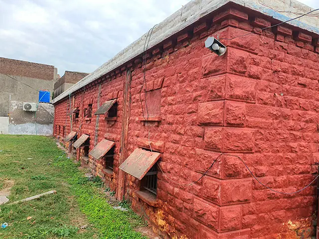  The windows opening onto the backyard feature stone covers designed to protect the station from stone-pelting during riots. 