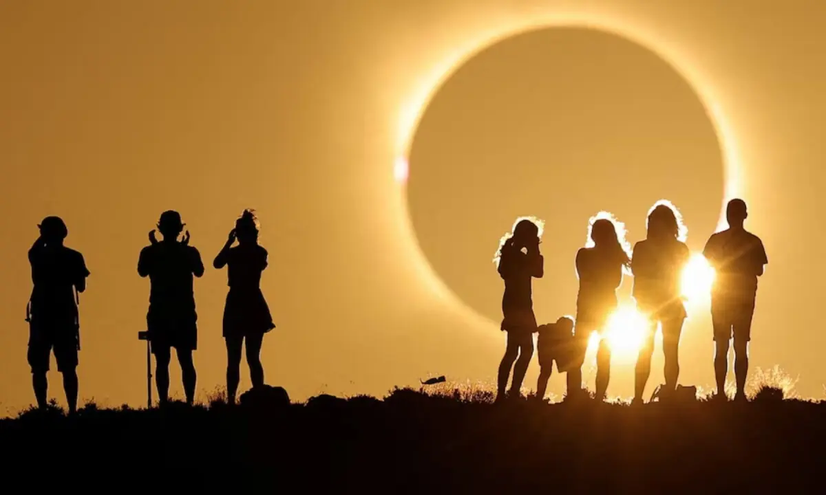 In pictures: Spectators watch in wonder as rare total solar eclipse plunges Spain into darkness