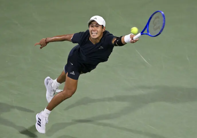  MONTREAL: Learner Tien of the US hits a forehand against compatriot Ben Shelton during their Montreal Masters semi-final at the IGA Stadium.&mdash;Reuters 
