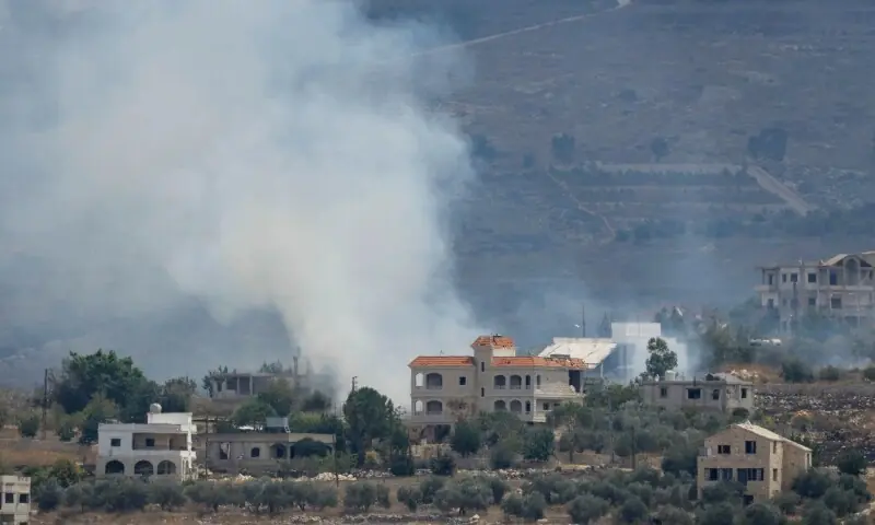 A photograph taken from the southern Lebanese village of Qabrikha shows smoke rising from burning fields in the village of Bani Hayyan, under the control of the Israeli military, about 10 kilometers from the Lebanon-Israel border on August 14, 2026. &mdash;AFP