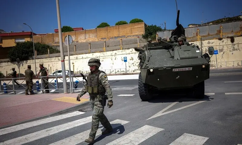 Spanish military arrives at the border with Morocco, following mass crossings of migrants on foot and by sea from Morocco into Spanish territory, in Ceuta, Spain, August 15, 2026. — Reuters