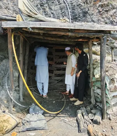   District administration officials seal a coal mine in Kunhar Hassanzai area, Torghar. &mdash; Dawn  