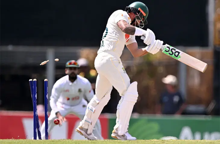 AUSTRALIAN opener Jake Weatherald is bowled by Bangladesh pacer Hasan Mahmud during the first Test at the Marrara Stadium on Saturday.—AFP