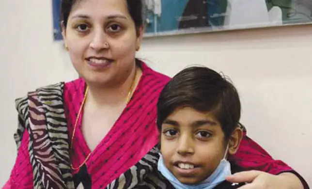   Unaiza Haider and her son Ammar in 2014 before leaving for India for a kidney and liver transplant | Courtesy Unaiza Haider 