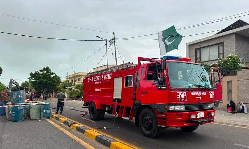 Emergency workers on stand-by at the site of the crude oil pipeline leak. — Sindh Information Department