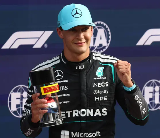 MERCEDES’ British driver George Russell celebrates after winning pole position for the Formula 1 Dutch Grand Prix sprint race at the Circuit Zandvoort on Friday.—Reuters