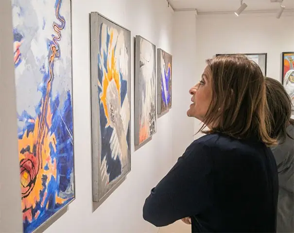 Visitors viewing artworks on display at the exhibition | Chawkandi Art Gallery