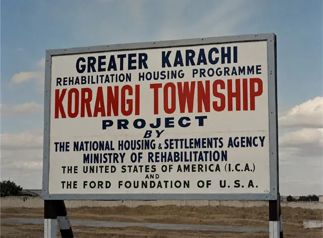 An upscaled screengrab from a British Film Institute (BFI) video showing the Korangi Township Scheme, filmed during Queen Elizabeth II’s visit to Pakistan in 1961: the Landhi-Korangi Township Scheme proposed the construction of around 40,000 houses in two satellite towns for refugees and low-income families | BFI