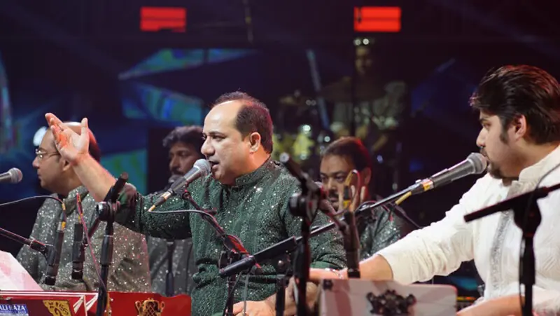 Rahat Fateh Ali Khan performs during a concert in Dhaka on December 22, 2024