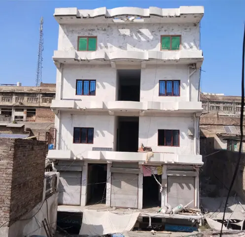 A commercial building constructed at the site of a demolished Hindu temple in Landi Kotal. — Dawn