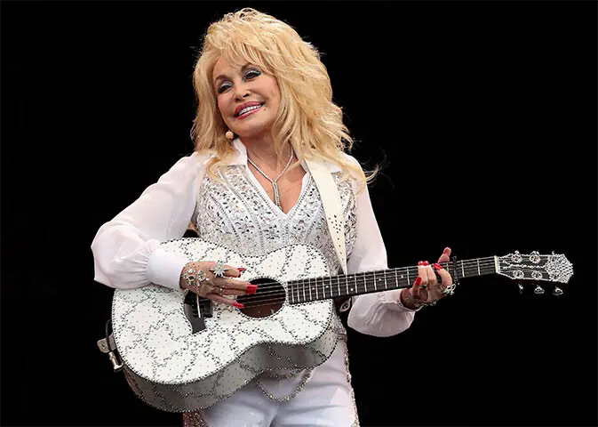  Dolly Parton was one of the best-selling female artists, with over 100 million records sold.&mdash;AFP 